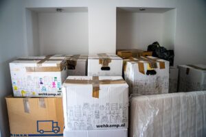 brown cardboard boxes on brown wooden table 1