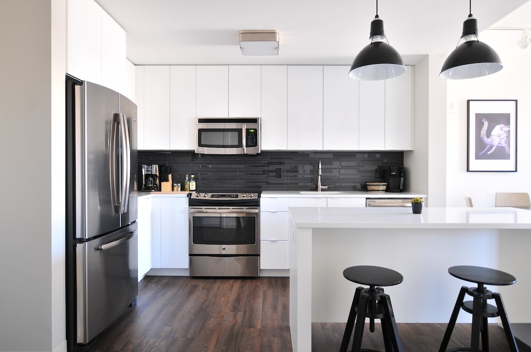 gray steel 3 door refrigerator near modular kitchen 1