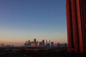 city skyline under blue sky during daytime